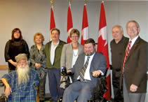 Jim Derksen, Shelly Rattai, Rose Flaig, John Young, Minister Diane Finley, Minister Steven Fletcher, Ross Young, Ken Burford